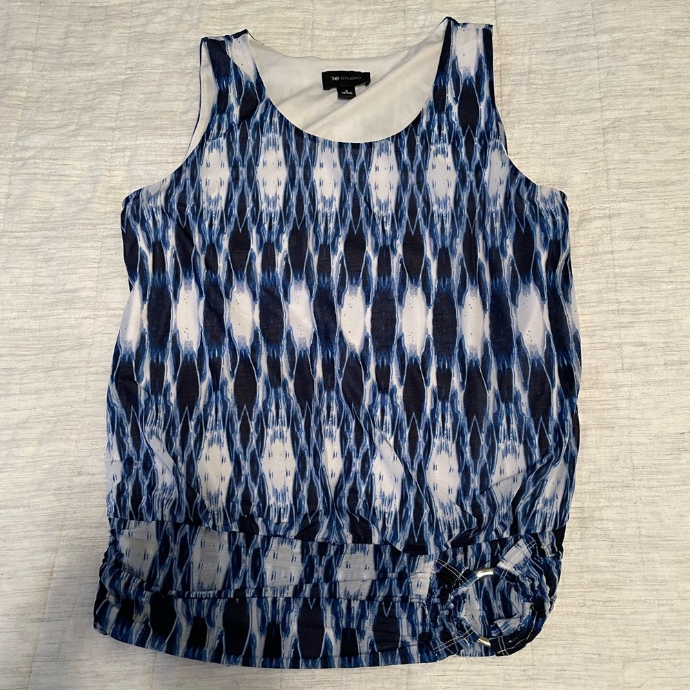 Blue and white tank top blouse, slightly worn.